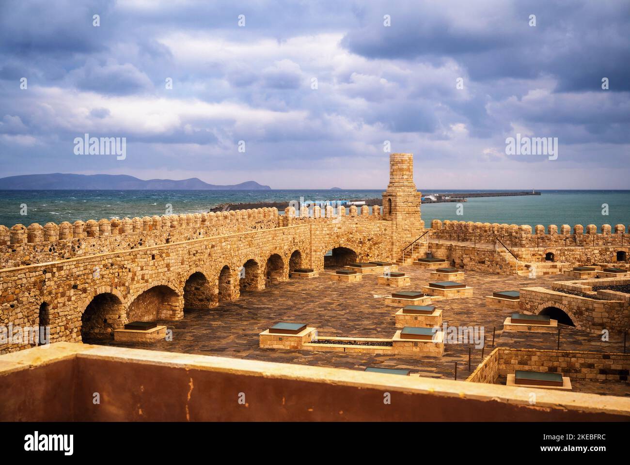Fortress Koules (Rocca al Mare), upper courtyard, gate, tower and fortifications in seaside. Heraklion, Crete, Greece. Stock Photo