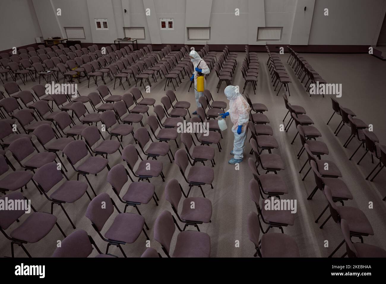 Curated visual reference: Cleaning Service Workers In Protective Suits Sanitizing The Furniture Photo Inspiration