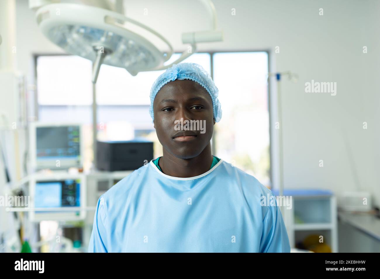 Portrait of african american male healthcare worker in surgical cap and ...