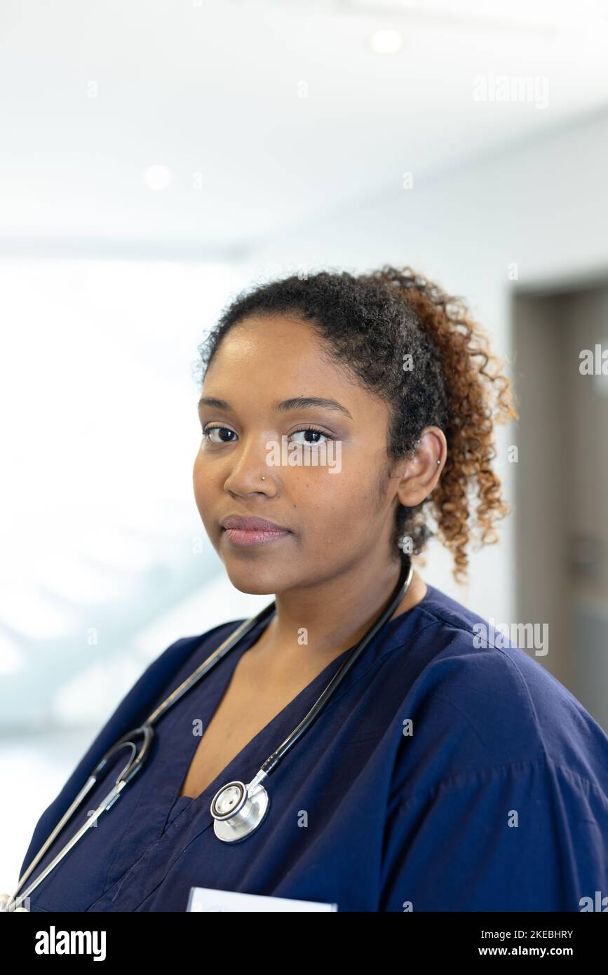 Vertical young female doctor hi-res stock photography and images - Alamy