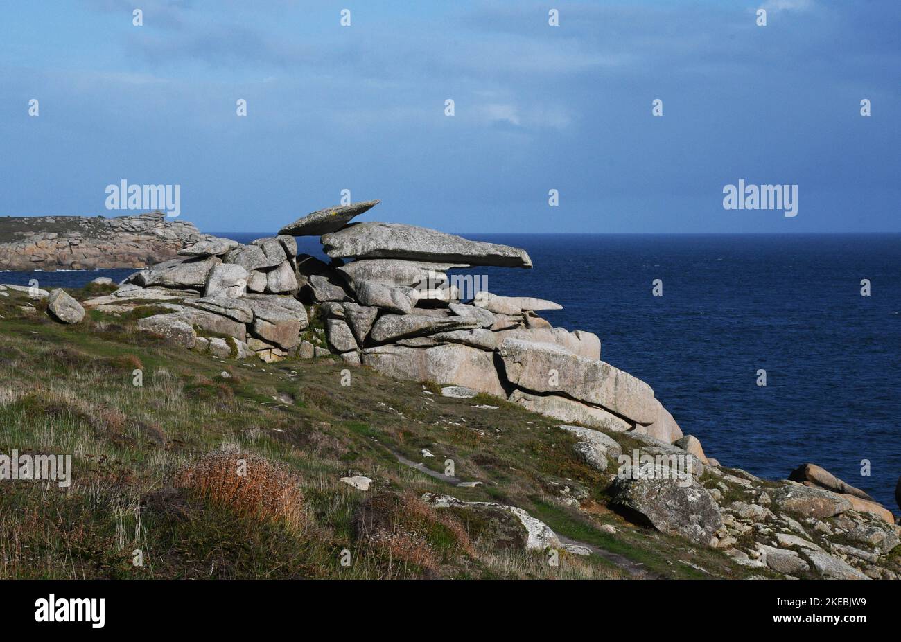 Pulpit rock one of the natural sculpture formed by weathering of the coarse–grained Hercynian granite on Peninnis Head on St.Marys the largest island Stock Photo