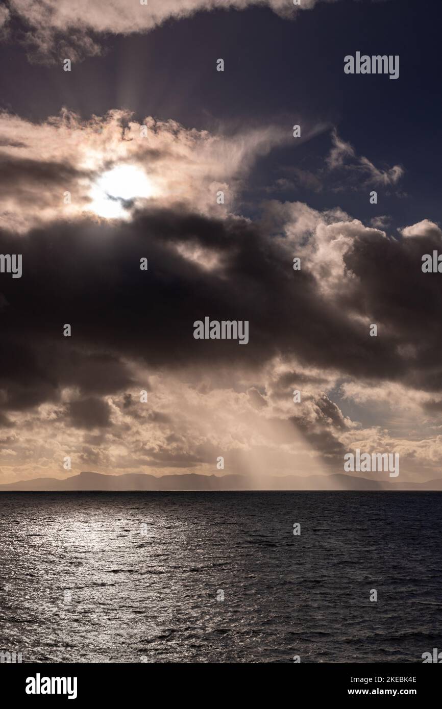 Sunbeams over the Atlantic ocean from the northwest coast of Scotland Stock Photo