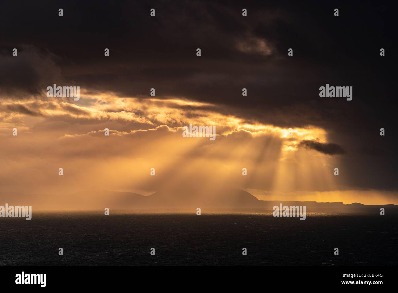 Sunbeams over the Atlantic ocean from the northwest coast of Scotland Stock Photo