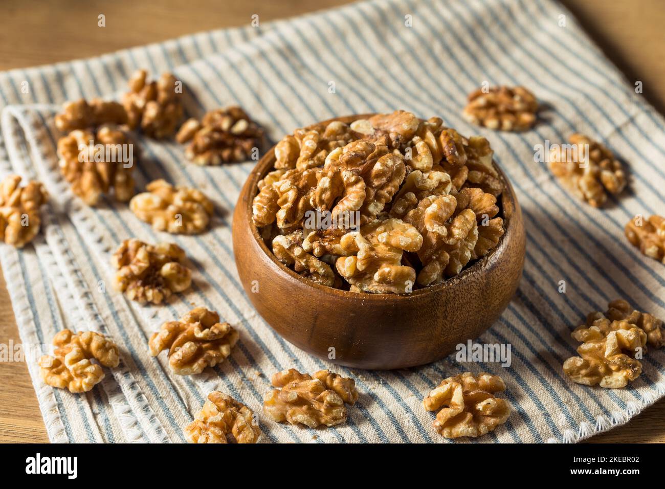 Raw Brown Organic Walnuts in a Bowl Stock Photo