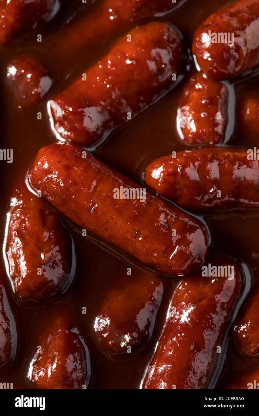 Homemade BBQ Cocktail Weiners in Sauce as an Appetizer Stock Photo