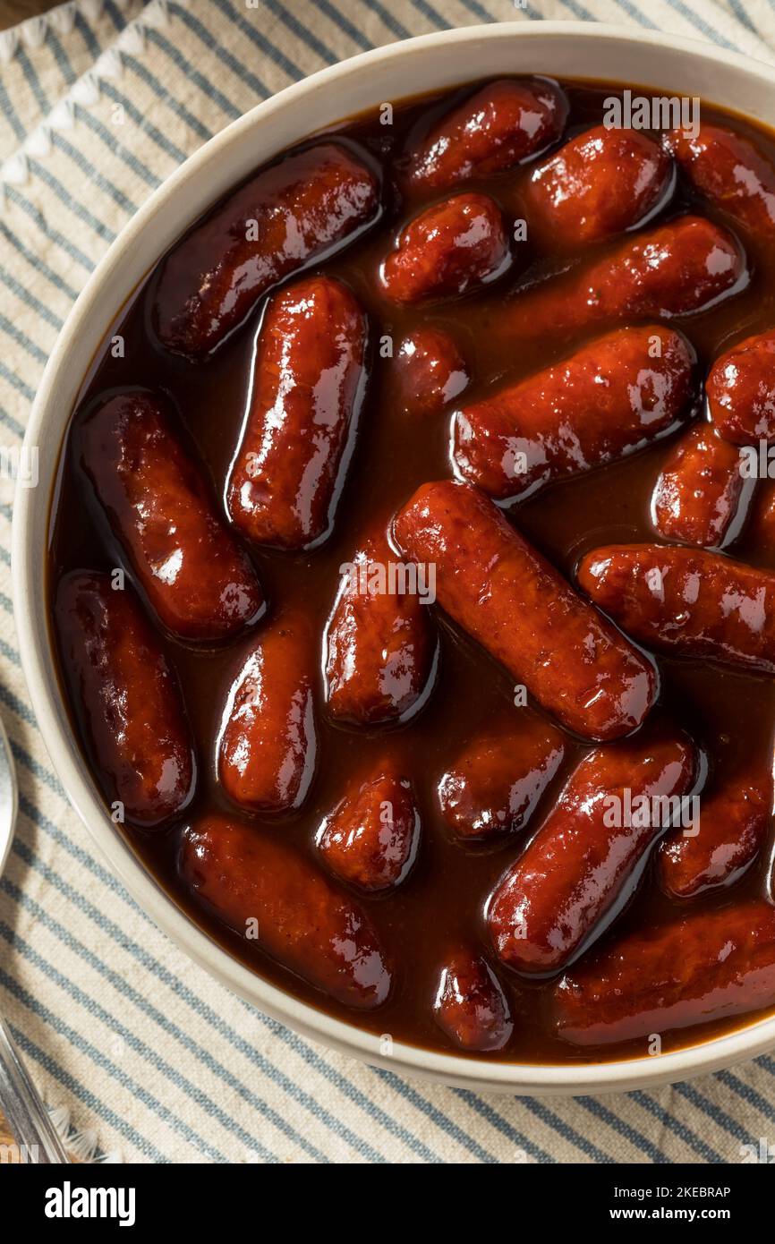 Homemade BBQ Cocktail Weiners in Sauce as an Appetizer Stock Photo