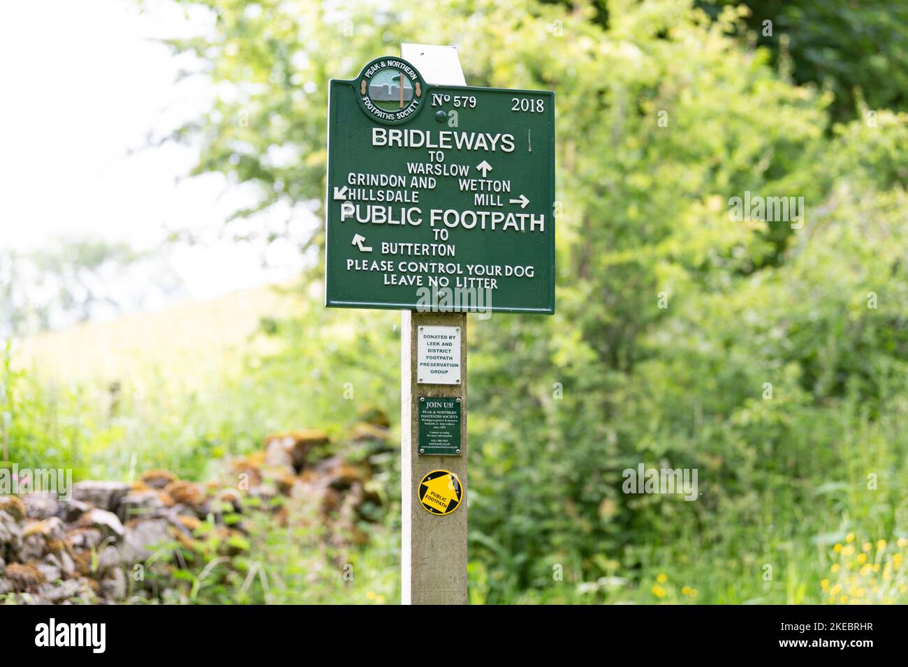 Peak and Northern Footpaths Society signpost no 579 at Hoo Brook Bridge, Butterton, Staffordshire Peak District, England, UK Stock Photo