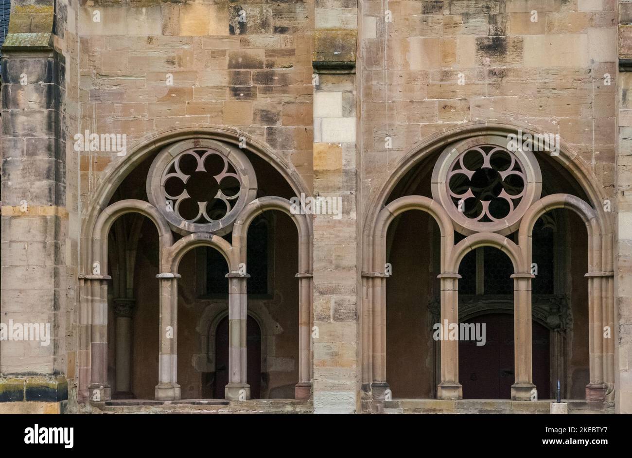 Close-up view of two traced windows of the Gothic cloister corridor built between 1245 and 1270, connecting the famous Trier Cathedral to the... Stock Photo