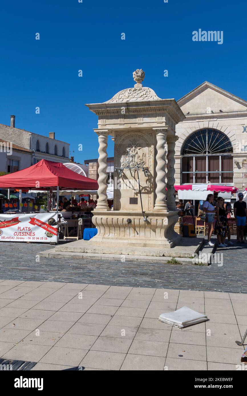 Ornate water fountain at the Chateau d'Oleron Market, Nouvelle Aquitaine, France Stock Photo