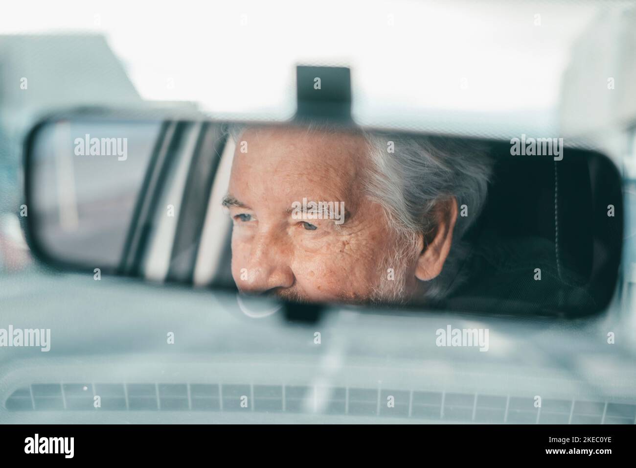 Old man driving car hi-res stock photography and images - Alamy