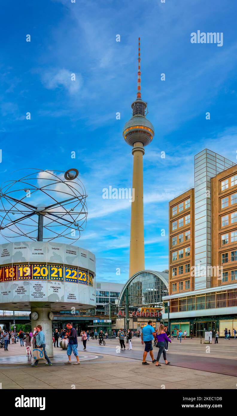 The world time clock and the television tower at Alexanderplatz in Berlin Stock Photo
