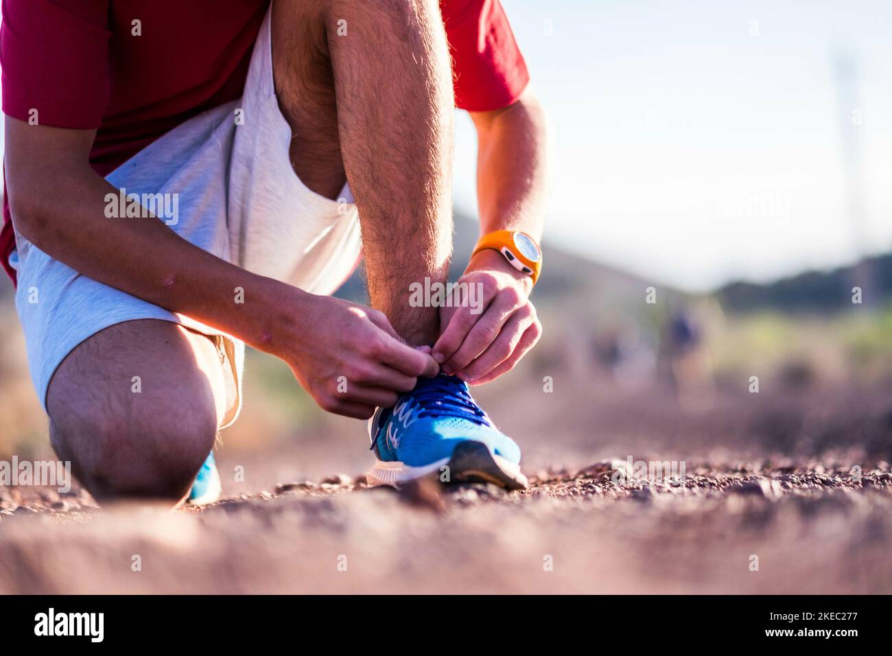 close up annd portrait of man taking a break after running or jogging