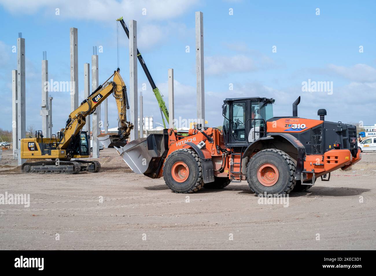 Construction site with excavator and wheel loader in summer Stock Photo ...