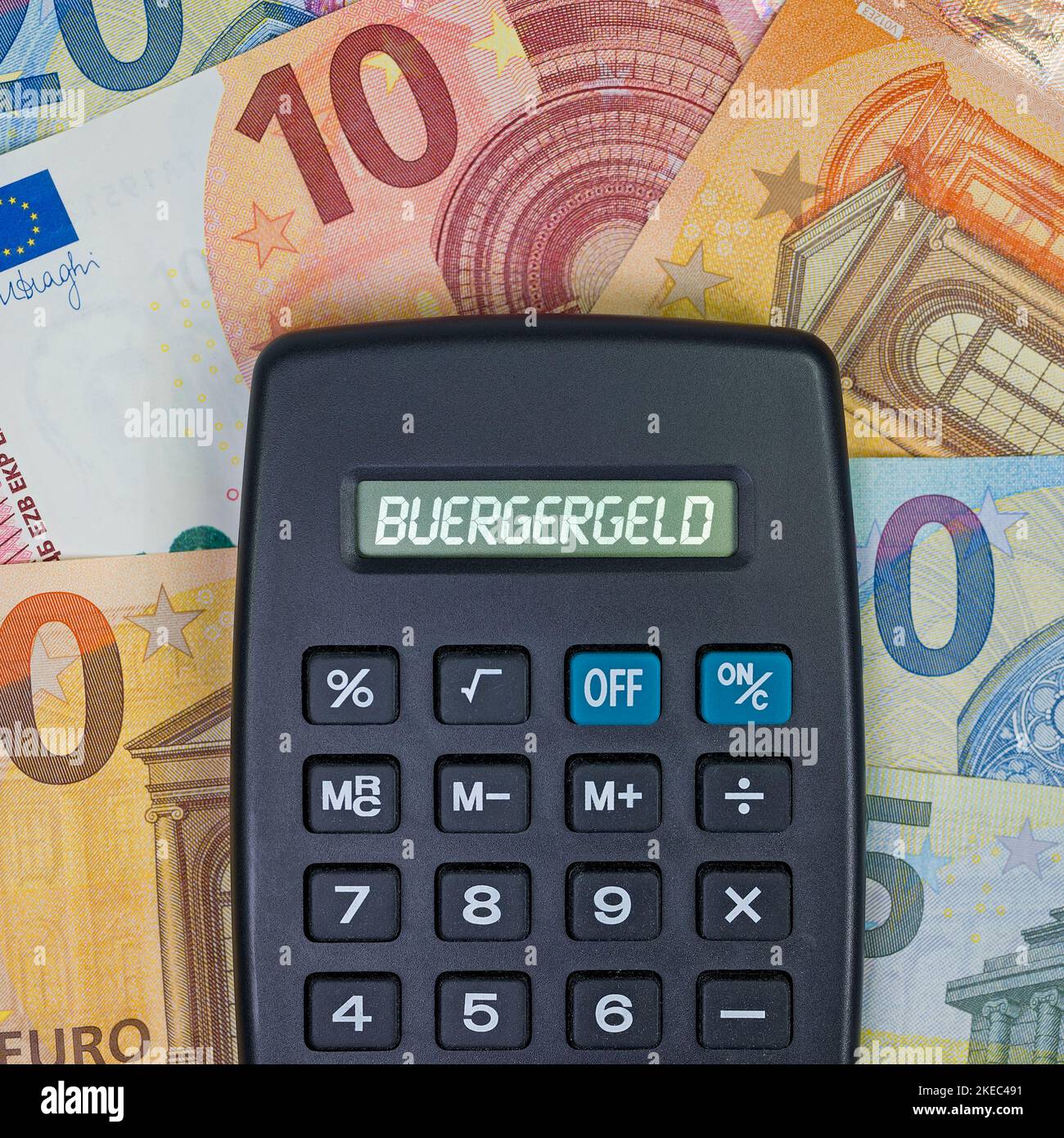Pocket calculator with the word "Bürgergeld" on the display