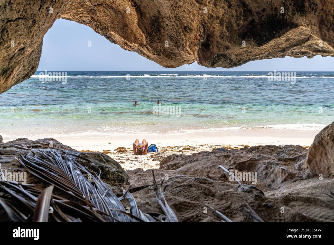North America, Caribbean, Greater Antilles, Hispaniola Island, Dominican Republic, Sama, Las Galeras, Cabo Sama, view from inside a small cave onto a beach Stock Photo