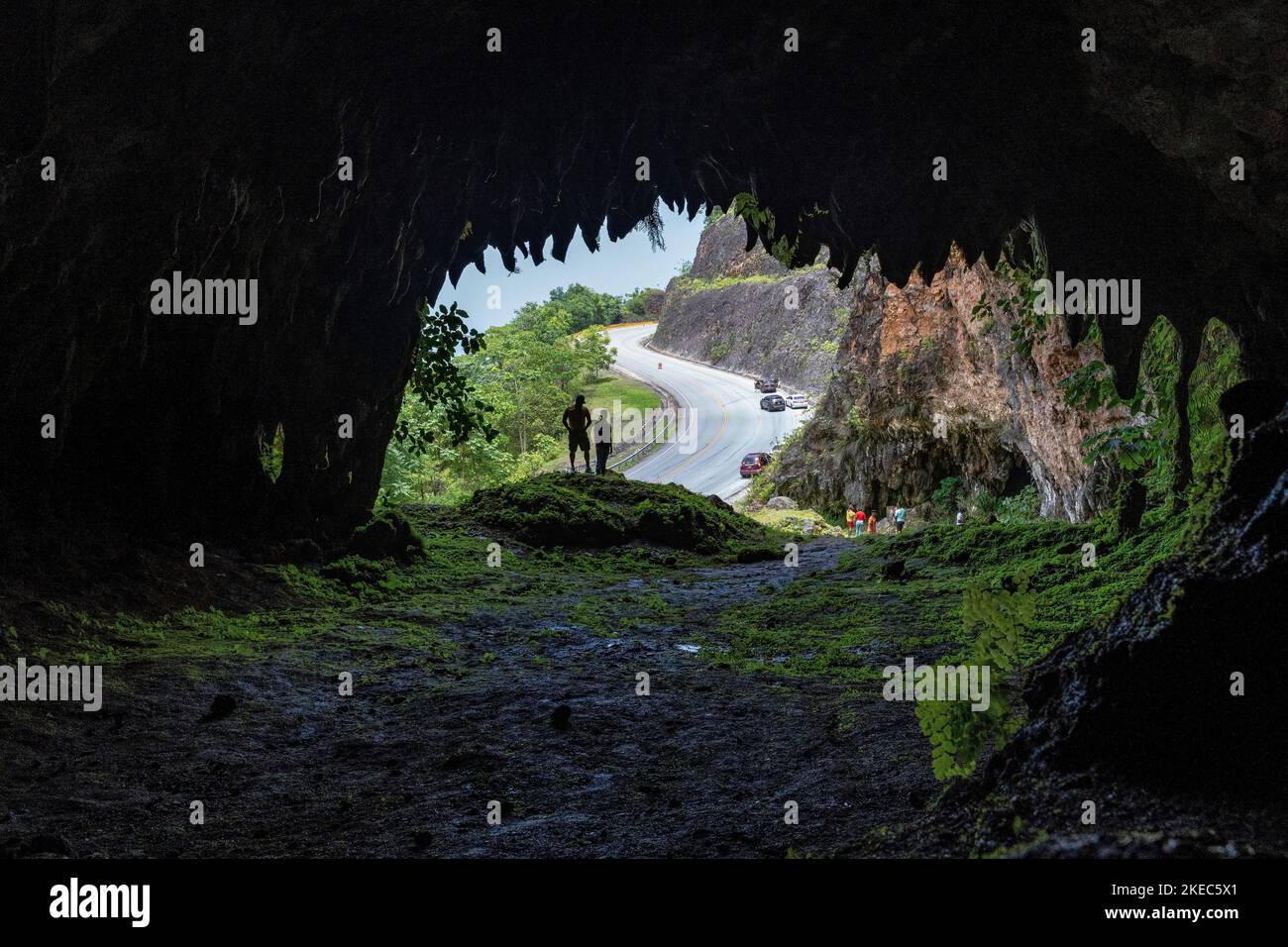 North America, Caribbean, Greater Antilles, Hispaniola Island, Dominican Republic, Sama, Boulevard Turístico del At ntico, Visitors at the Cave on the Panoramic Road Stock Photo