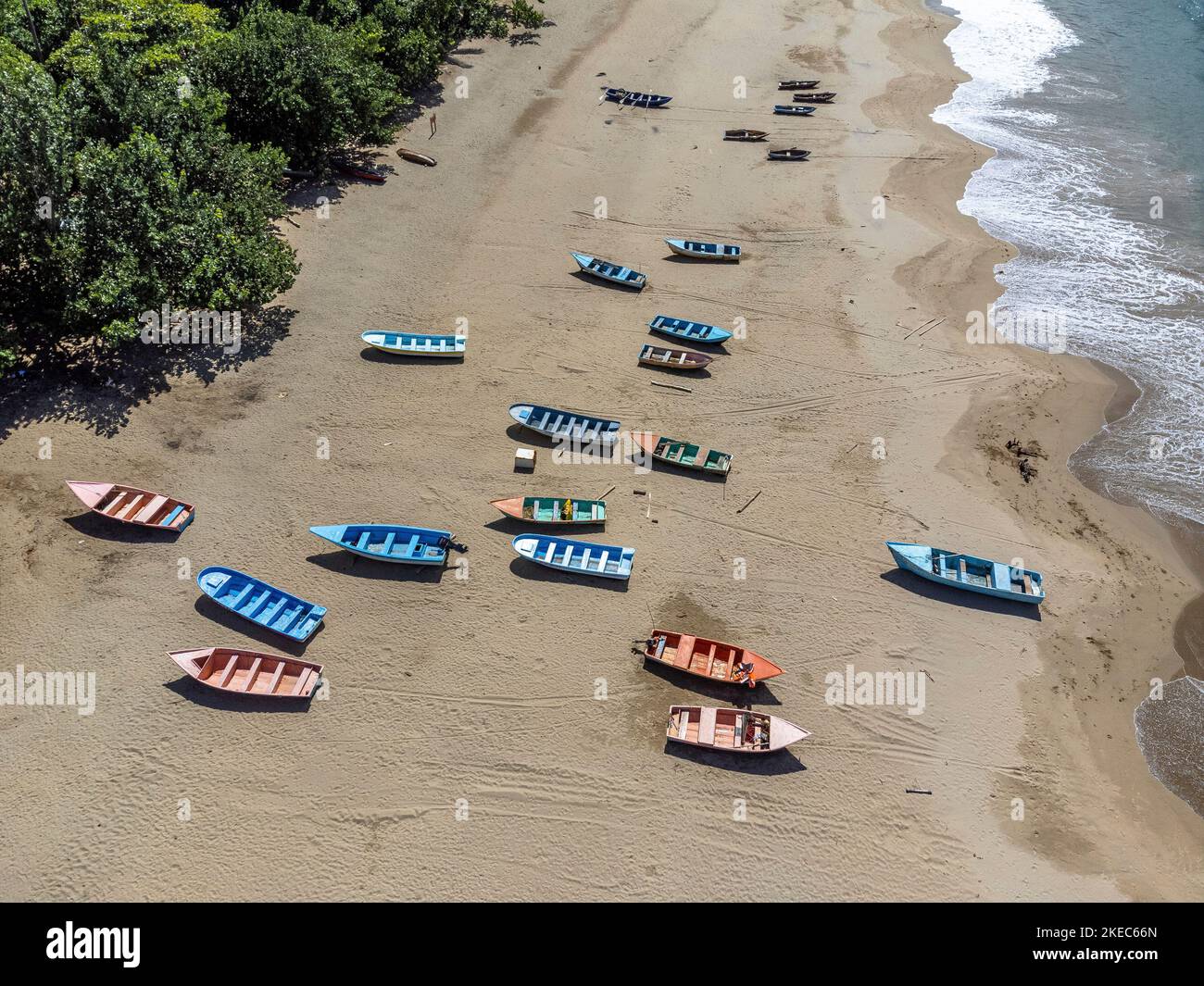 North America, Caribbean, Greater Antilles, Hispaniola Island, Dominican Republic, Sama, El Valle, Colorful wooden boats at Playa El Valle beach Stock Photo