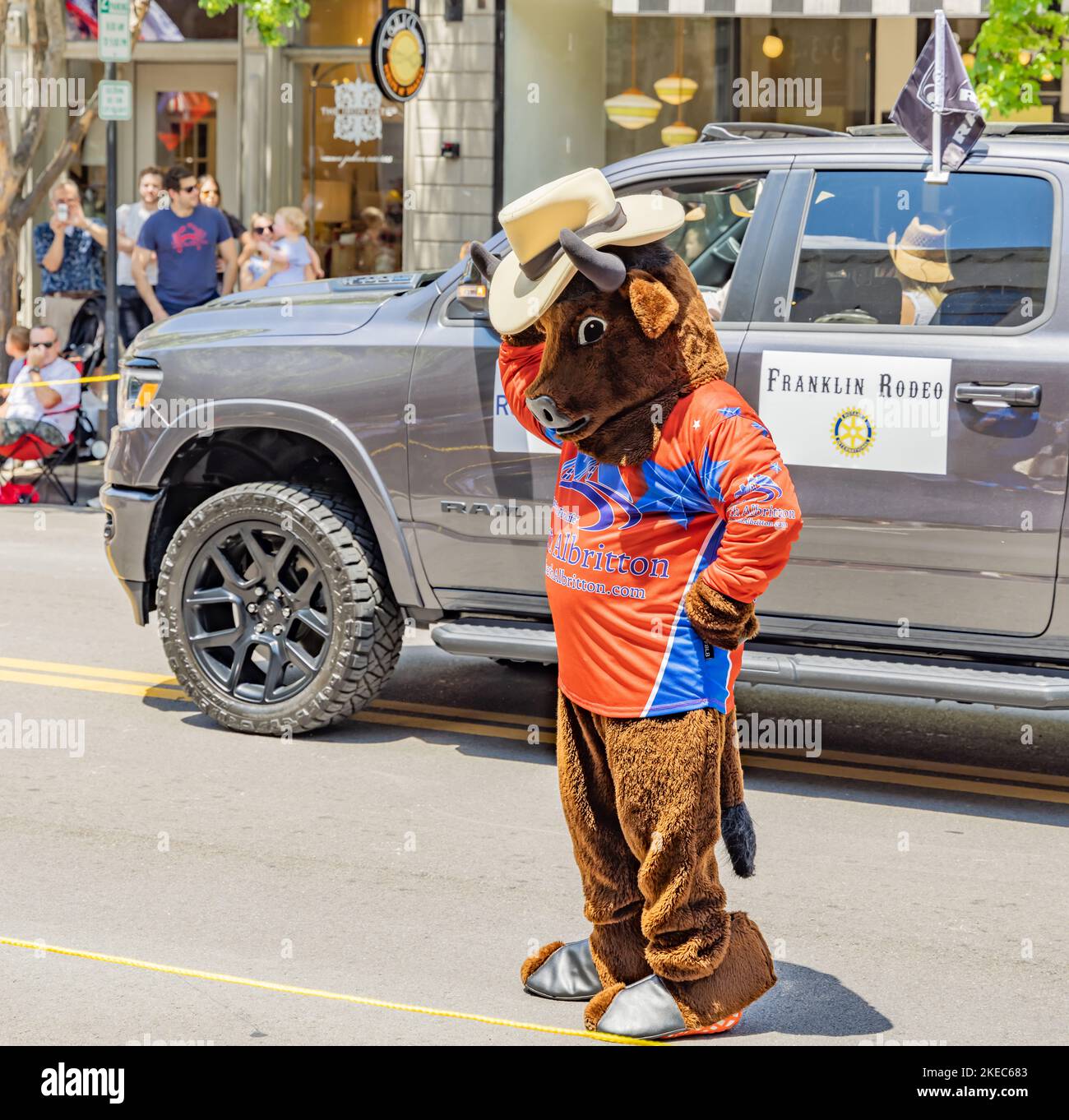 Person in a bull costume advertising Albritton in the Franklin Rodeo Parade. Stock Photo