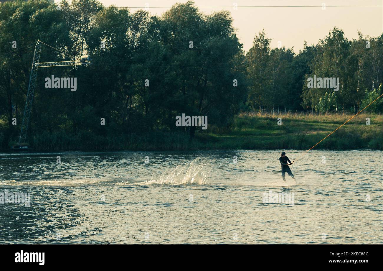 cable wakeboarding, wakesurfing at cable wake park Stock Photo Alamy