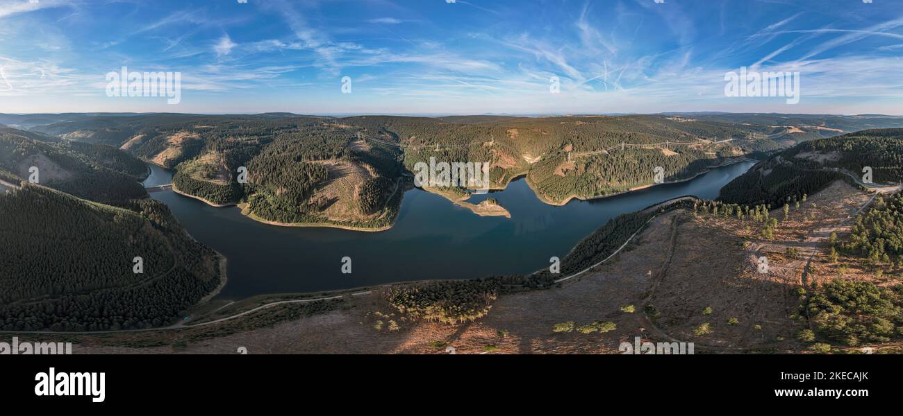 Germany, Thuringia, Goldisthal, reservoir, largest pumped storage power plant in Germany, forest, mountains, power lines, overview, aerial view, panoramic photo Stock Photo