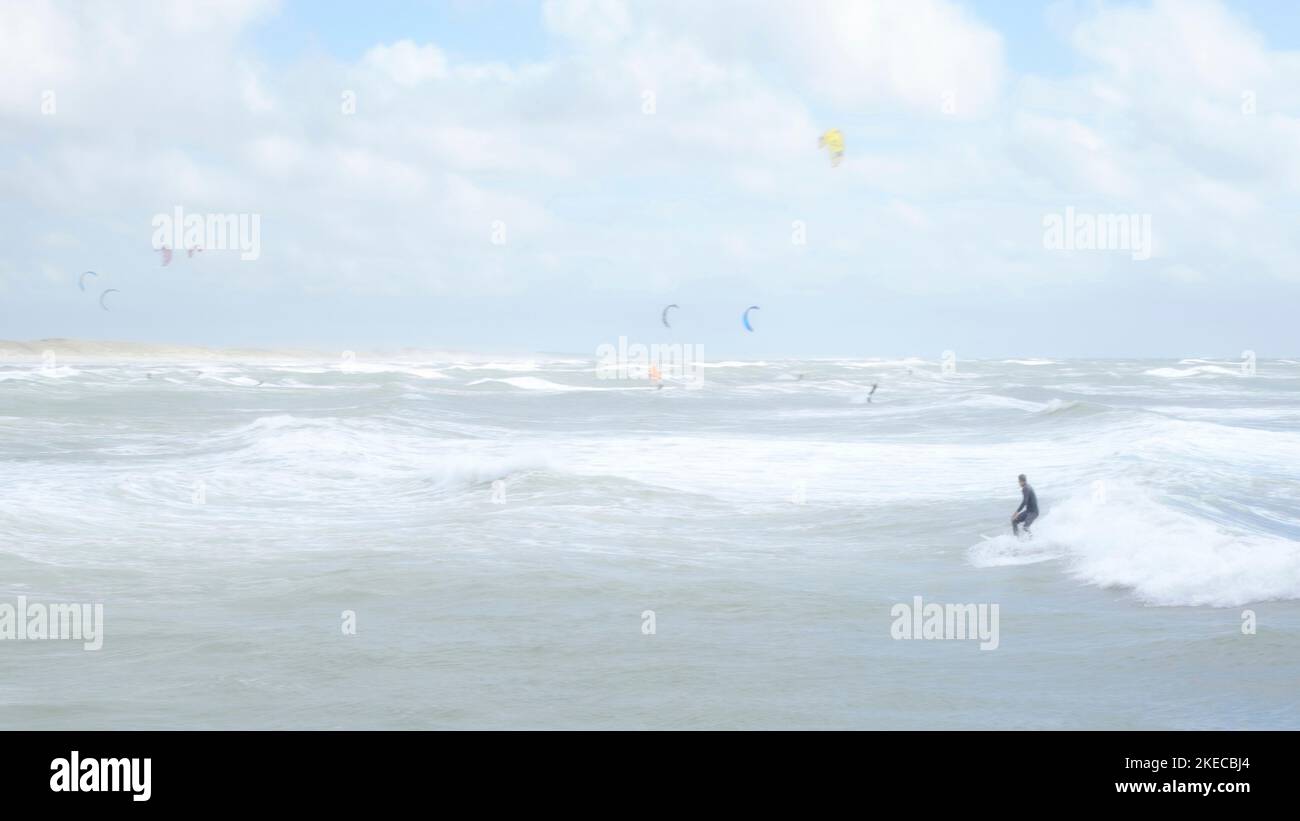 Surfers and kiters at the North Sea Stock Photo