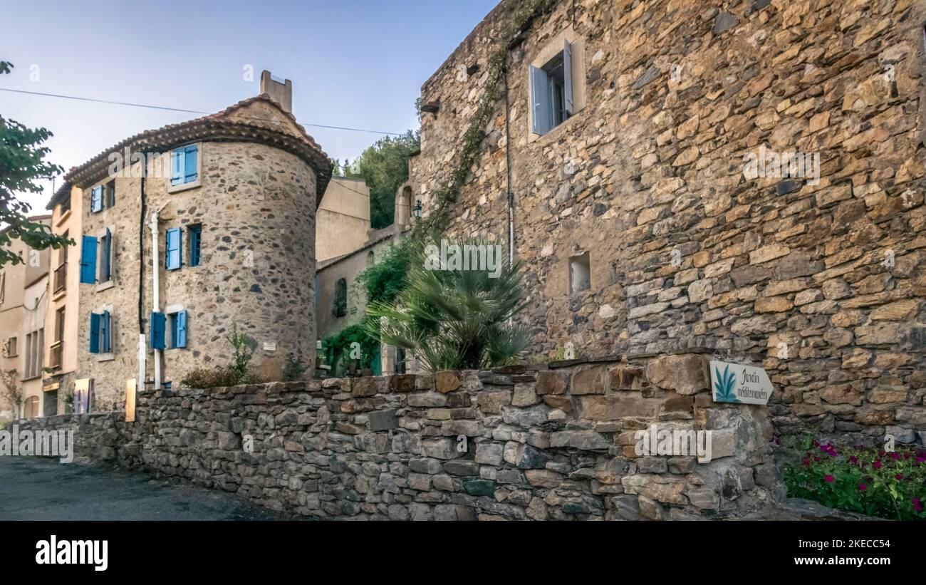 Village street in Roquebrun. The commune is located in the Regional Natural Park of Haut-Languedoc. Stock Photo