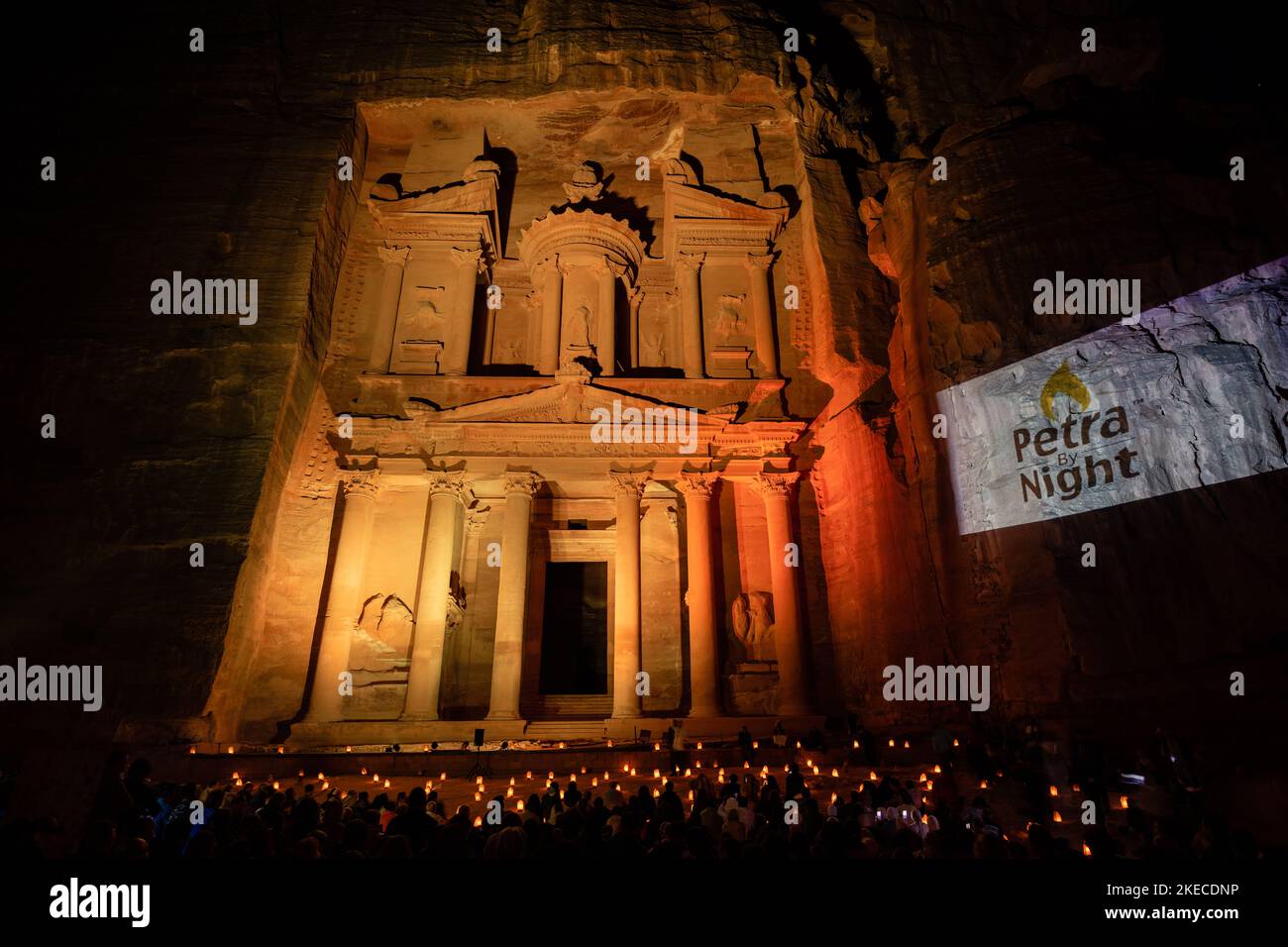 Petra, Jordan - October 27 2022: The Treasury or Al Khazneh Facade in Petra by Night illuminated by Candles Stock Photo