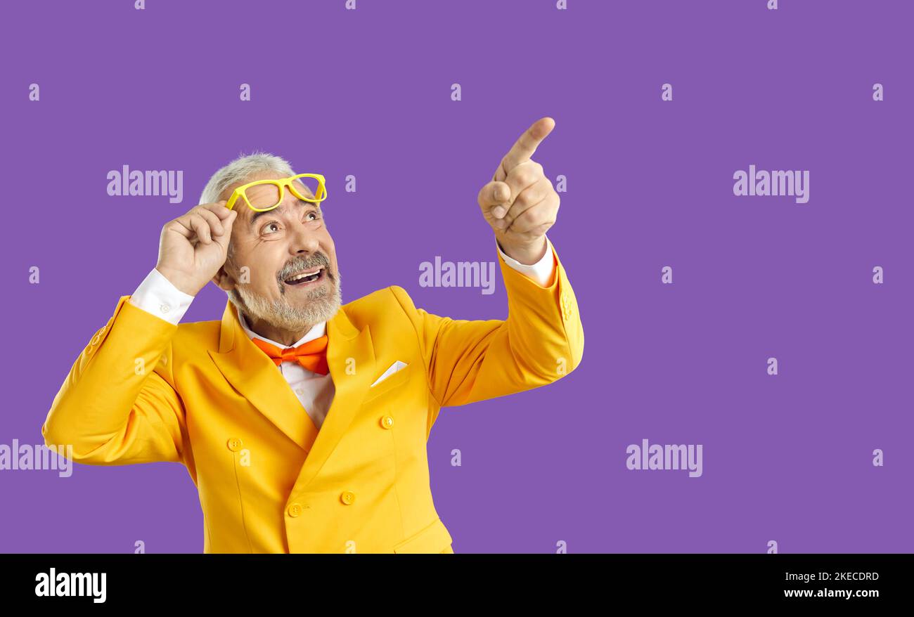 Funny mature man point at good deal Stock Photo