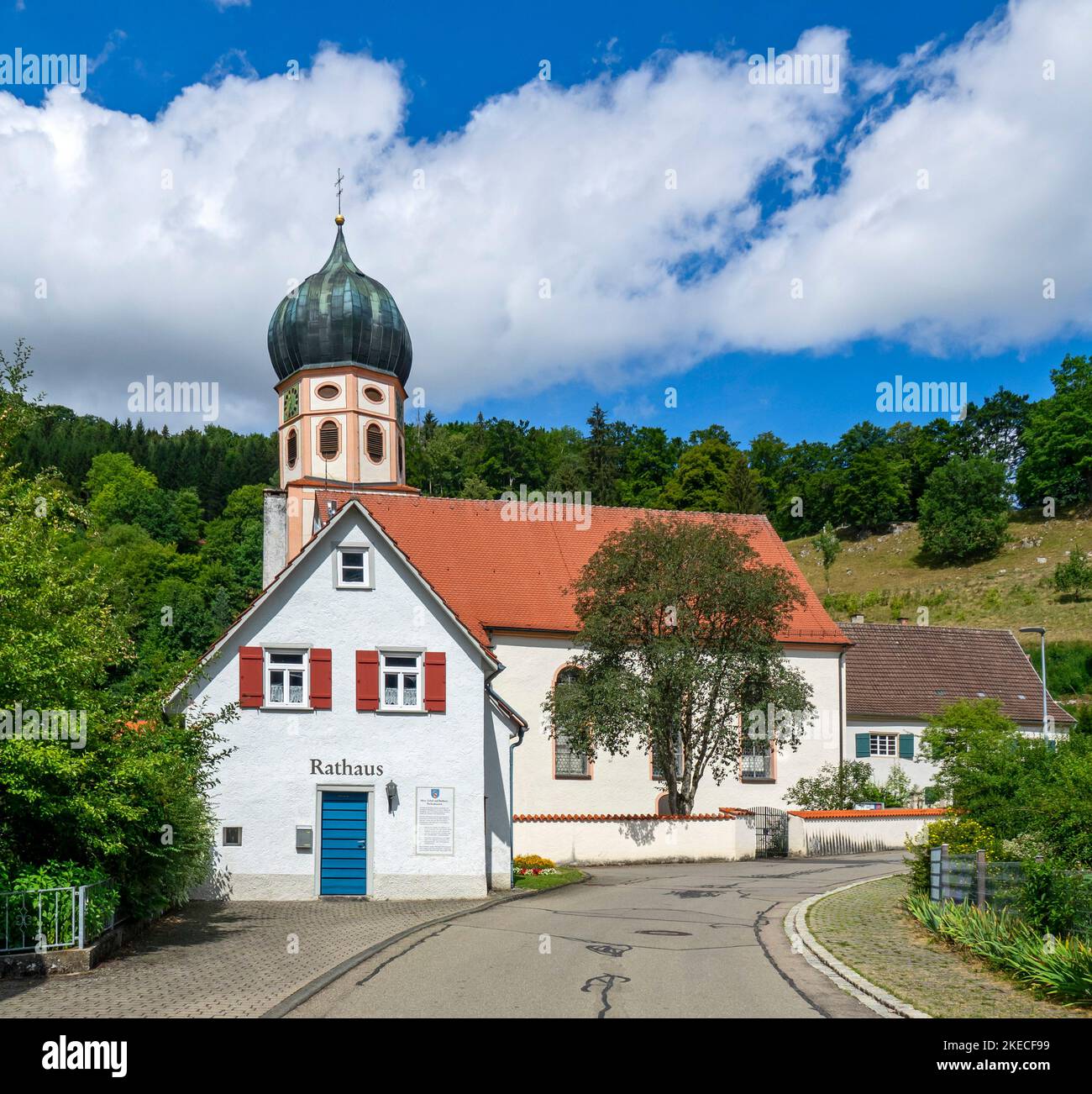 Bichishausen, town hall and St. Gallus church in the valley of the Great Lauter in the biosphere area in the Swabian Alb. Stock Photo