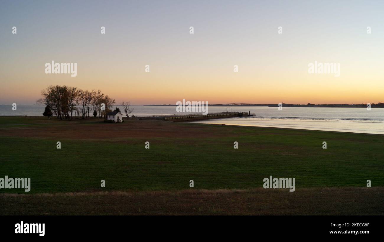Fort Mott State Park waterfront, sunset view with Delaware River, Pennsville Township, NJ, USA Stock Photo