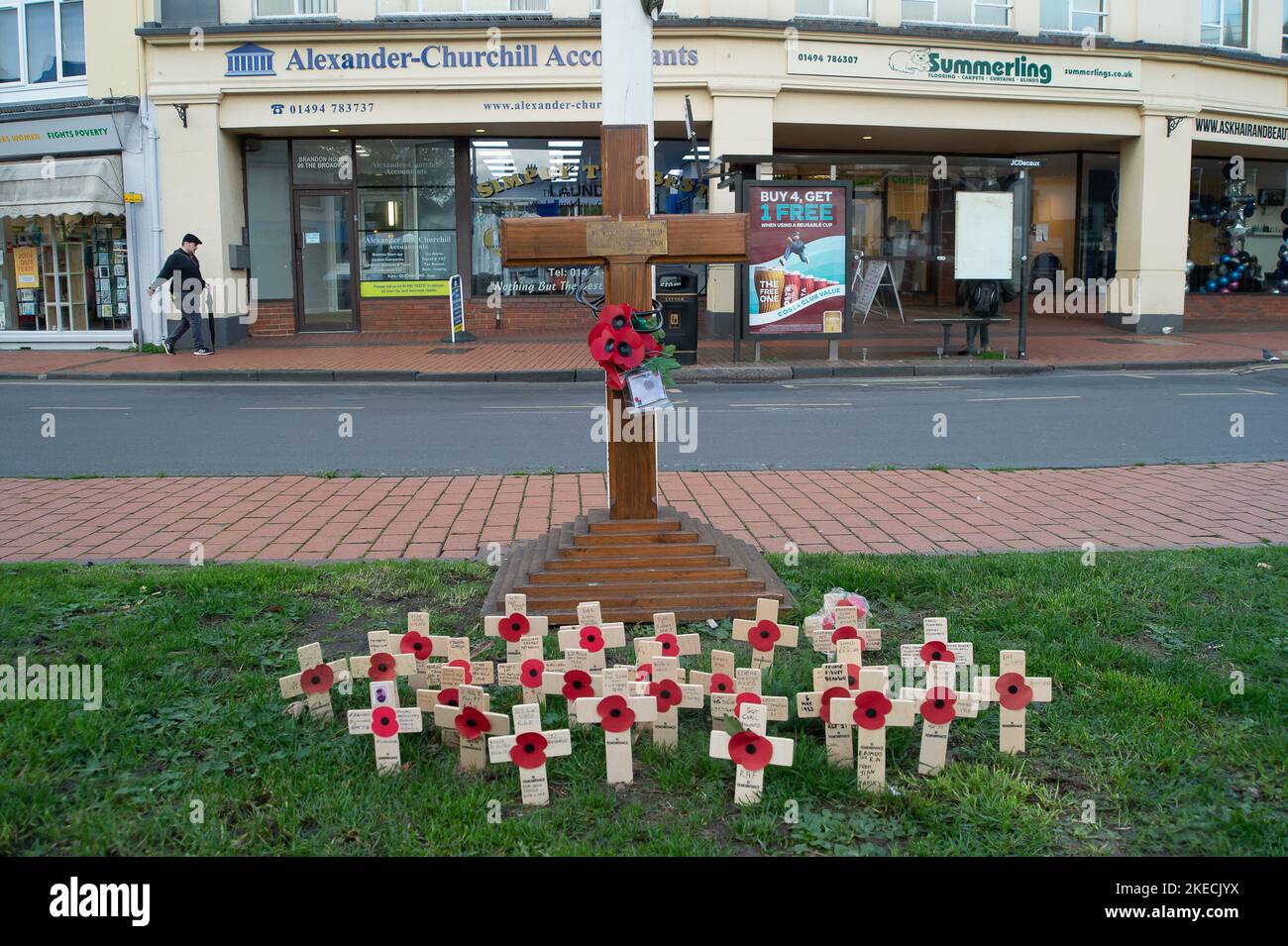 Chesham, Buckinghamshire. UK. The names of war dead are remembered on crosses by the War Memorial in Chesham Town Centre ahead of Remembrance Sunday. Credit: Maureen McLean/Alamy Live News Stock Photo