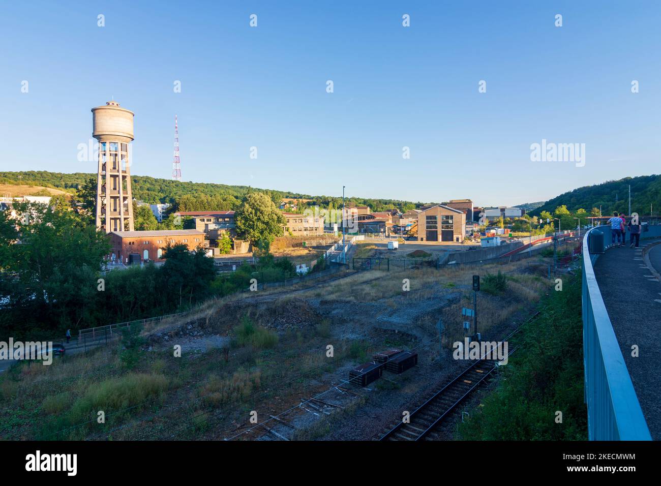 Dudelange (Diddeleng, Düdelingen), water tower in former ARBED steelworks area, RTL broadcasting tower in Luxembourg Stock Photo