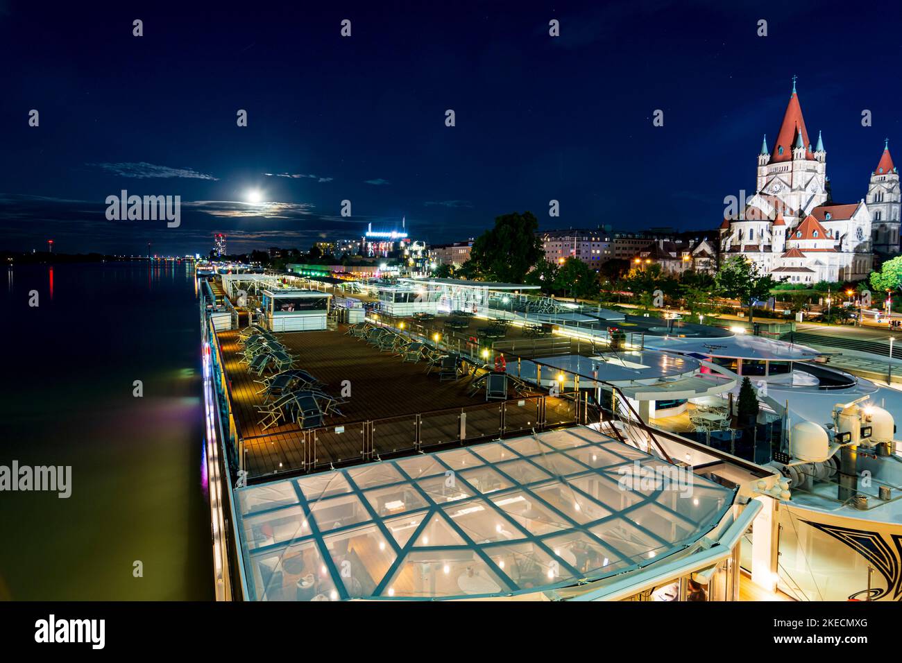 Vienna, river Donau (Danueb), full moon, cruise ships at ship dock