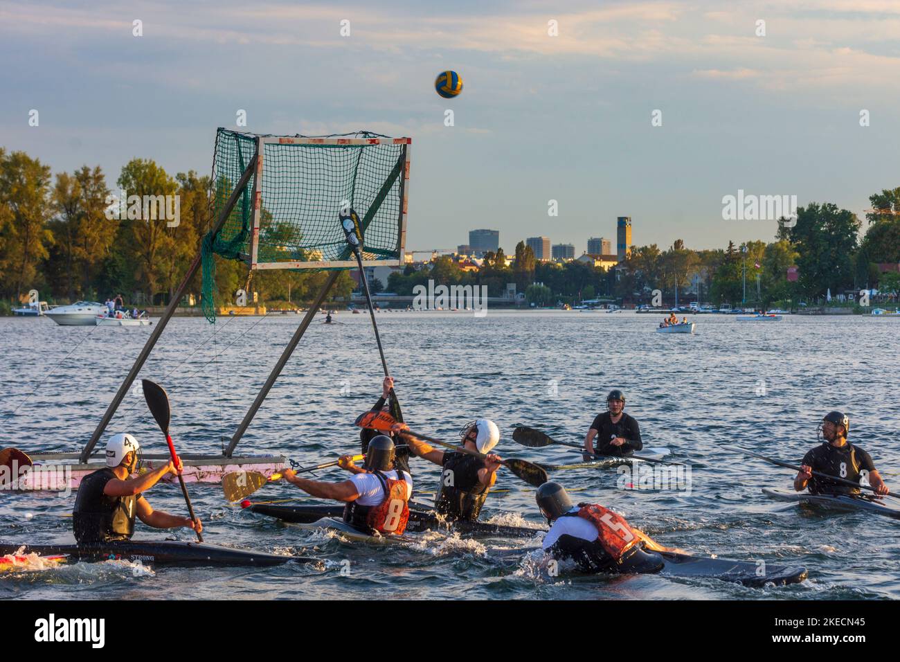 Vienna, kanu polo paddler in a competition game on oxbow lake Alte