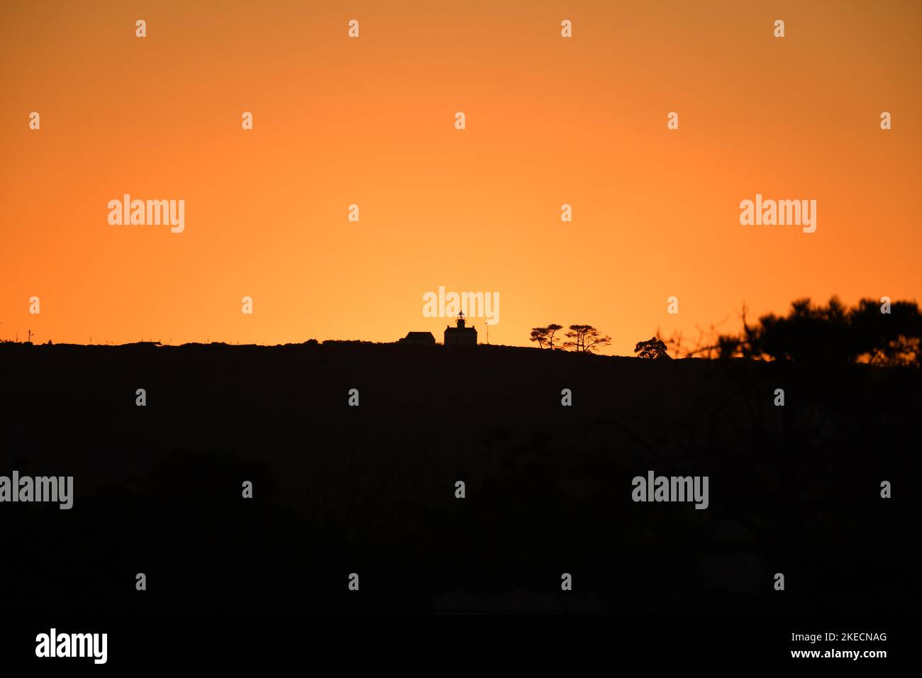 Cabrillo National Monument, located on Point Loma in San Diego, California,  at sunset as seen from Coronado, California Stock Photo