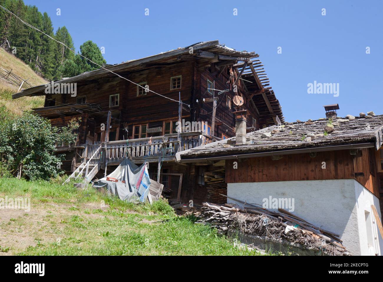 old abandoned house of a mountain farm in the South Tyrolean Ulten Valley Stock Photo