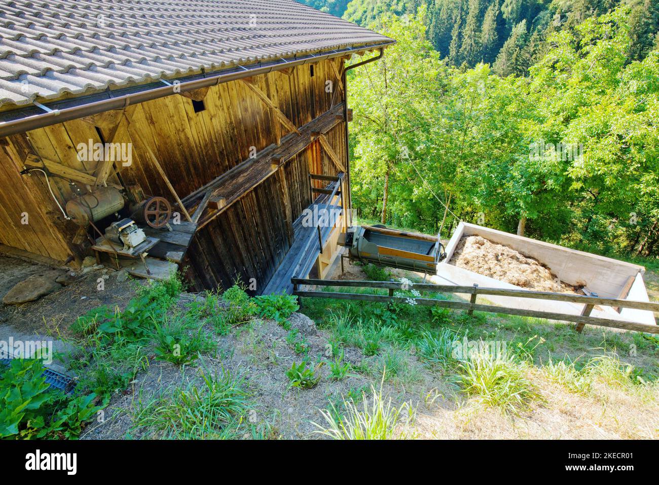 Barn in steep slope on mountain farm in South Tyrol Ulten Valley Stock Photo
