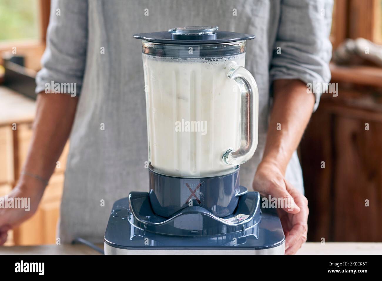 Steps for the preparation of almond milk, mass is ground in the blender