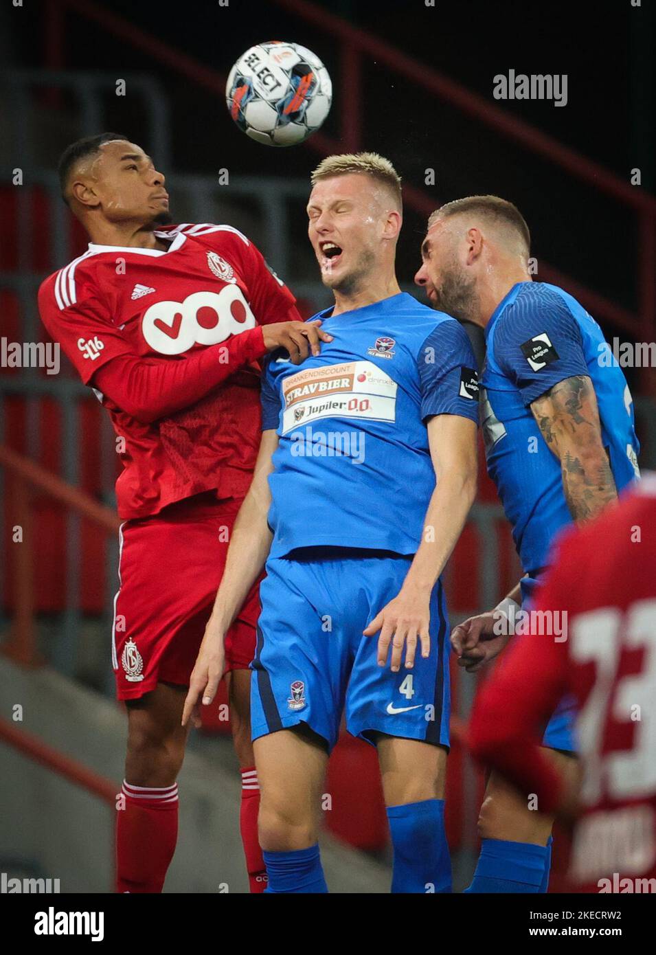 SL16's Nicholas Rizzo and Dender's Michael Lallemand fight for the ball ...