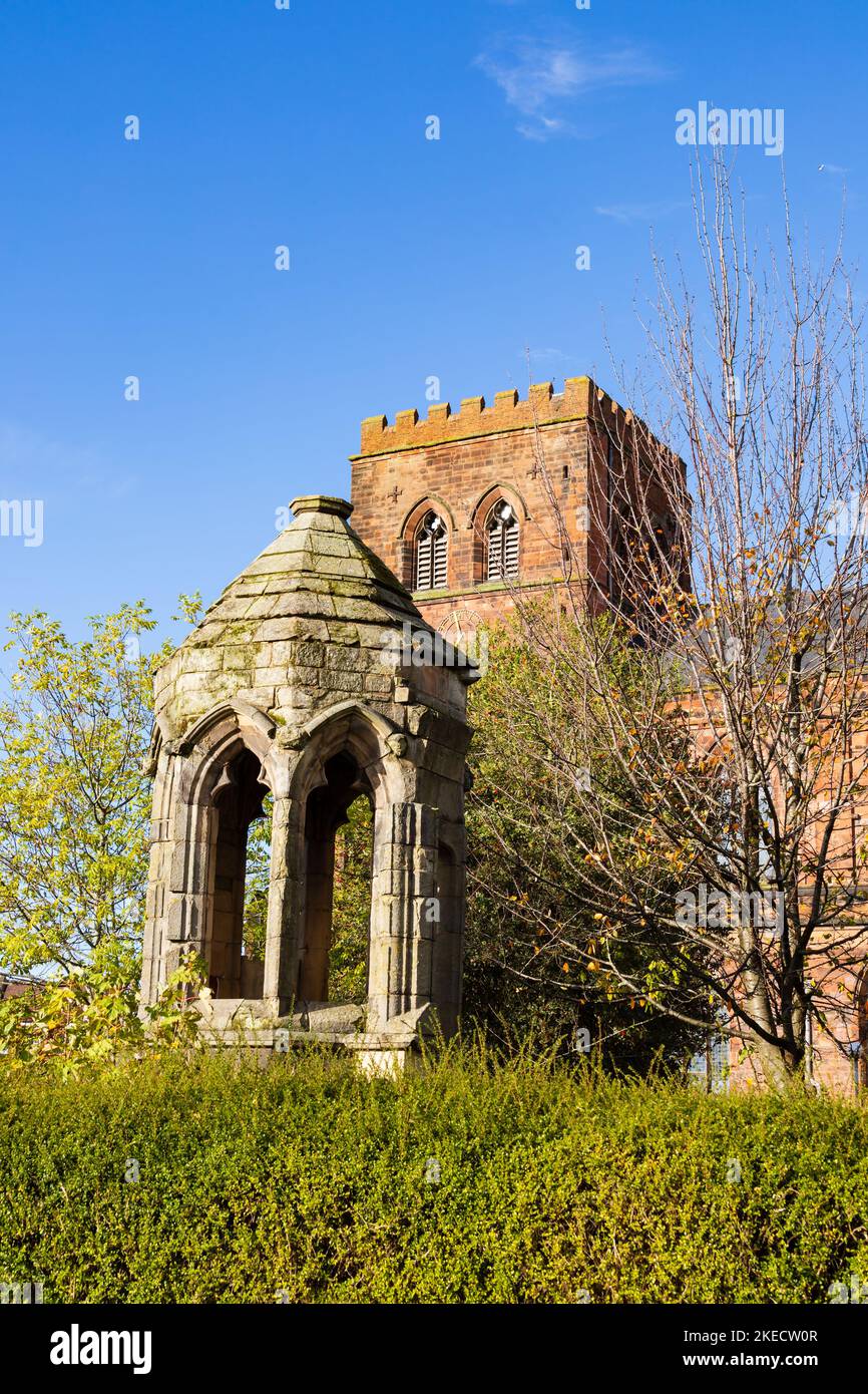 The original 1300 carved pulpit in front of The Abbey church of St Peter and St Paul,  Shrewsbury, Shropshire, England. Stock Photo