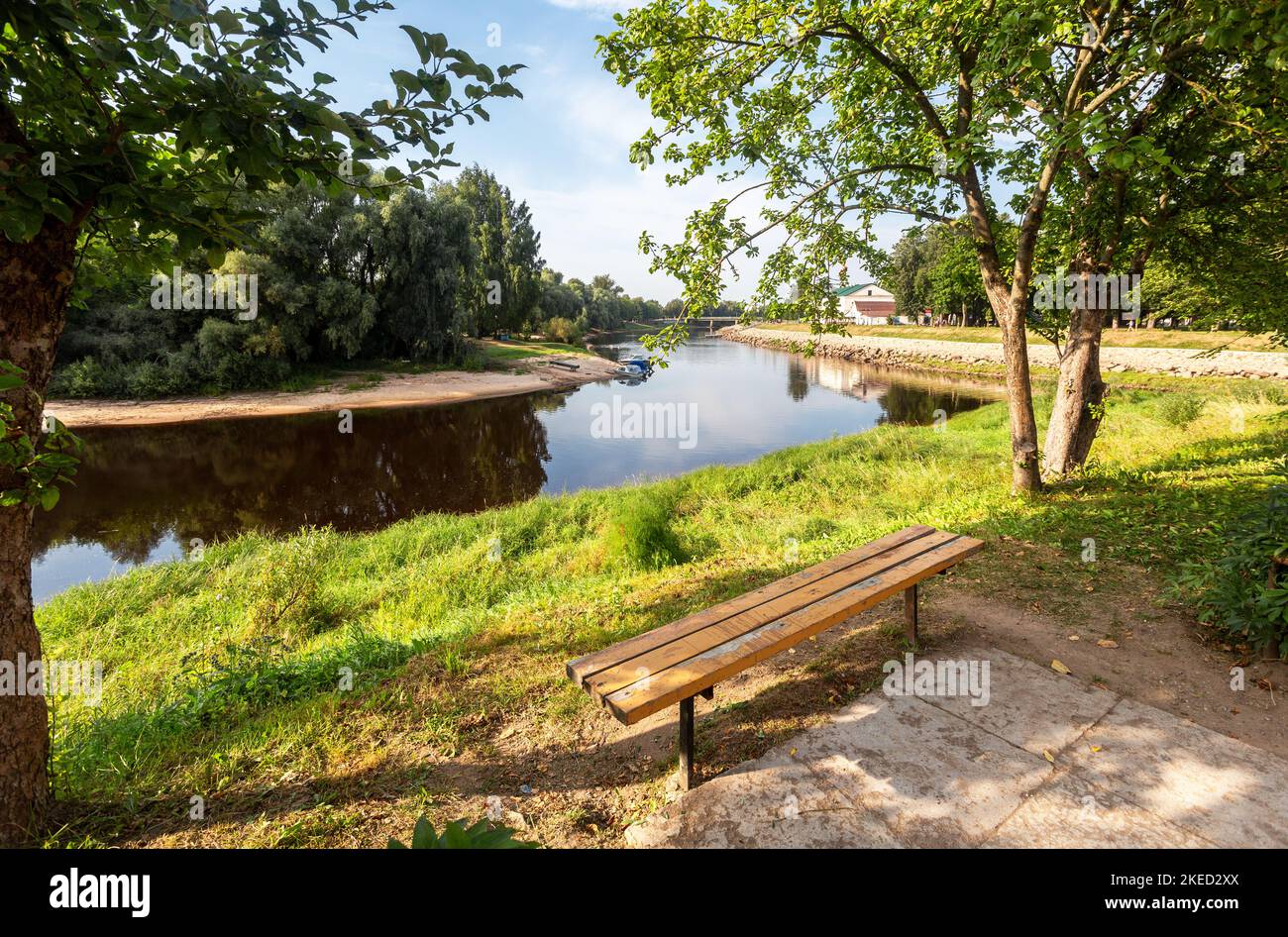 View of the calm current of the Polist River in the ancient city of Staraya Russa in summer day. Beauty of provincial cities in Russia Stock Photo