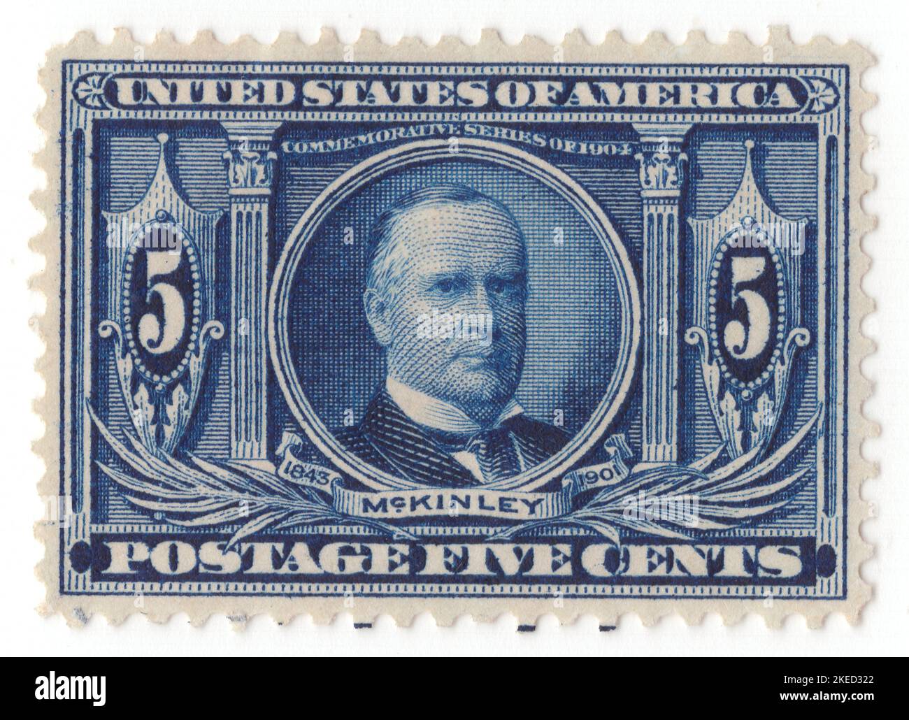 USA - 1904: An 5 cents dark blue postage stamp depicting portrait of William McKinley, Louisiana Purchase Exposition. 25th president of the United States, serving from 1897 until his assassination in 1901. As a politician he led a realignment that made his Republican Party largely dominant in the industrial states and nationwide until the 1930s. He presided over victory in the Spanish–American War of 1898; gained control of Hawaii, Puerto Rico, the Philippines and Cuba; restored prosperity after a deep depression; rejected the inflationary monetary policy of free silver Stock Photo