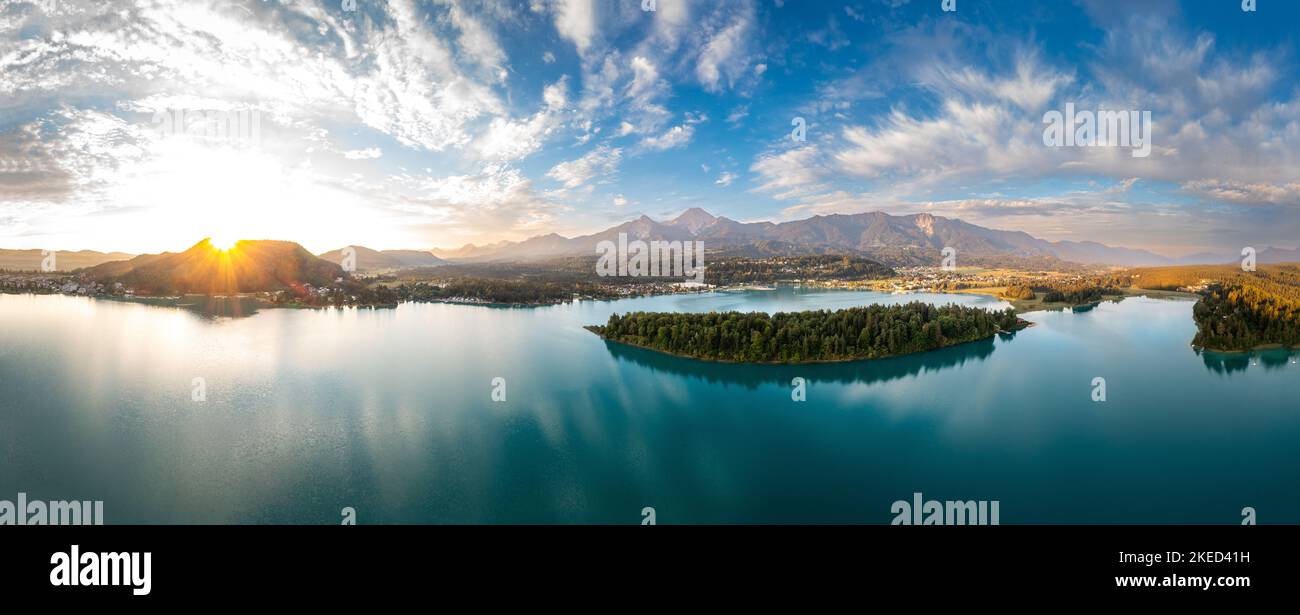 Lake Faakersee Panorama. Aerial view to the famous touristic destination in Carinthia, Austria during sunrise Stock Photo