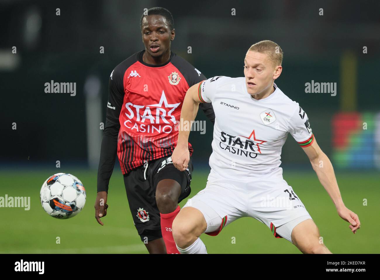 Seraing's Molla Wague and OHL's Casper De Norre fight for the ball