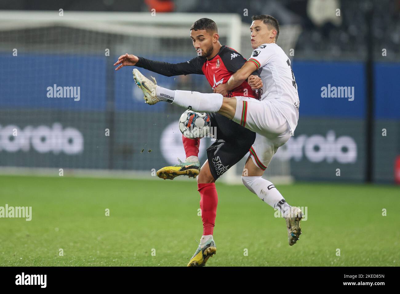 Seraing's Simon Elisor and OHL's Federico Ricca fight for the ball