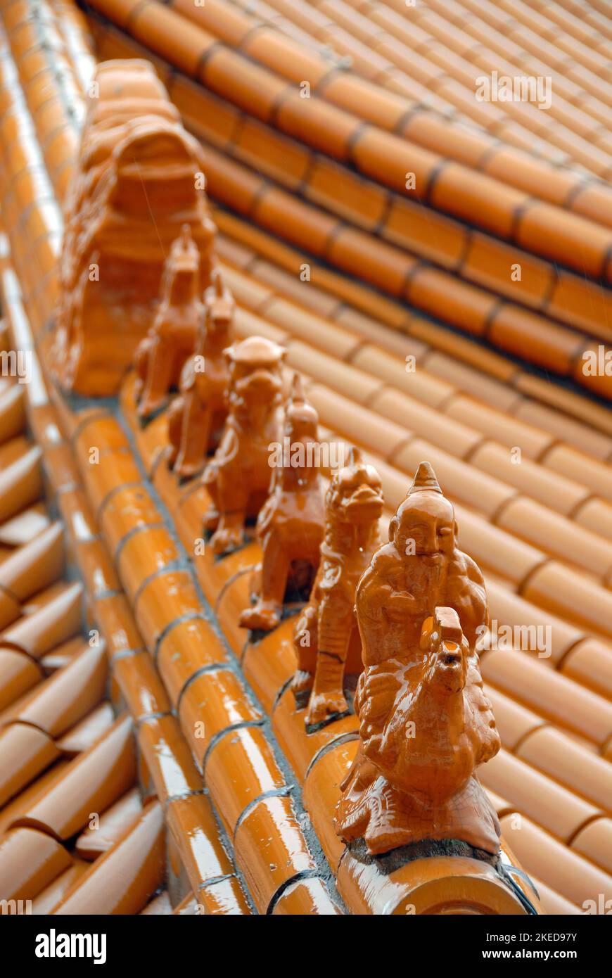 Decorative finials in the form of mythical beasts on a roof at the Fo Guang Shan Nan Tien Buddhist Temple at Berkeley near Wollongong, Australia. Stock Photo