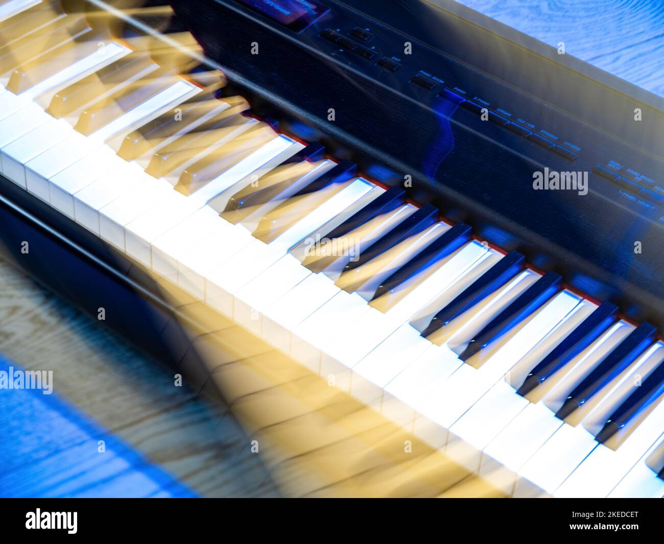 Fragment of a musical instrument. White and black piano keys. Close-up ...