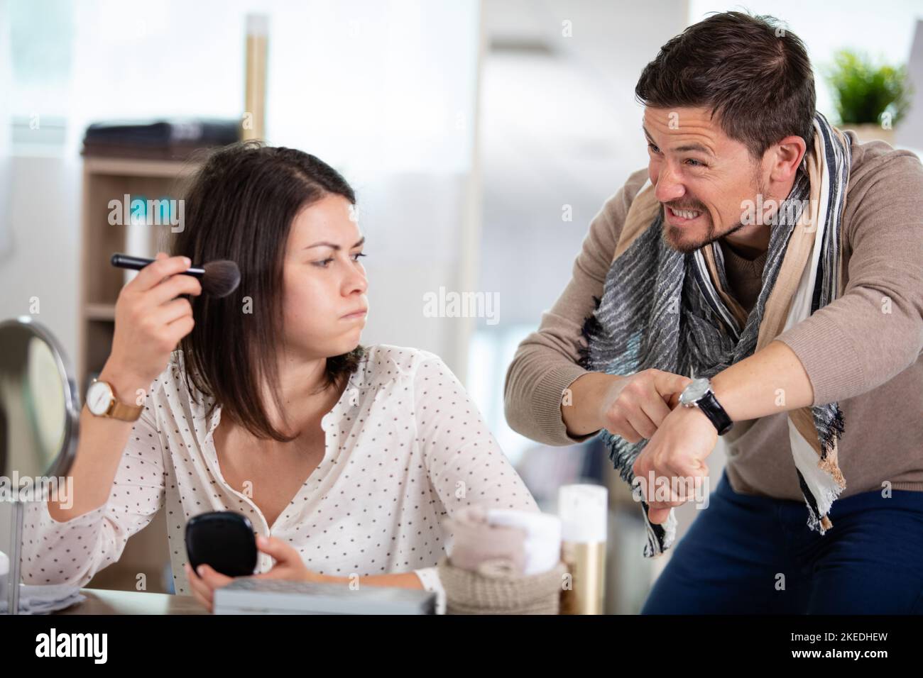 man hurry pointing to watch time Stock Photo