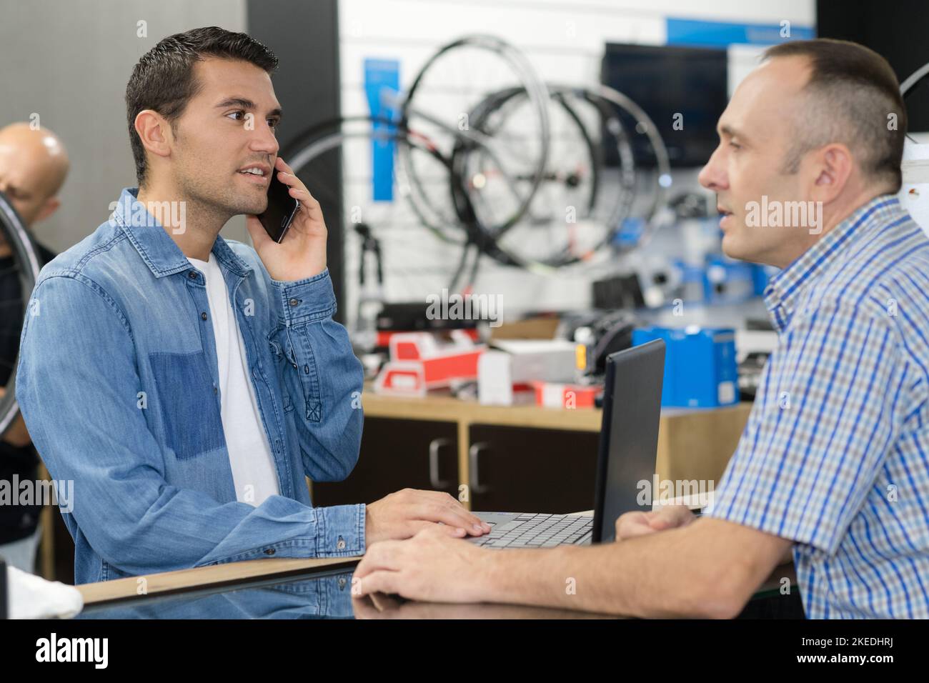 customer choosing a bike Stock Photo Alamy