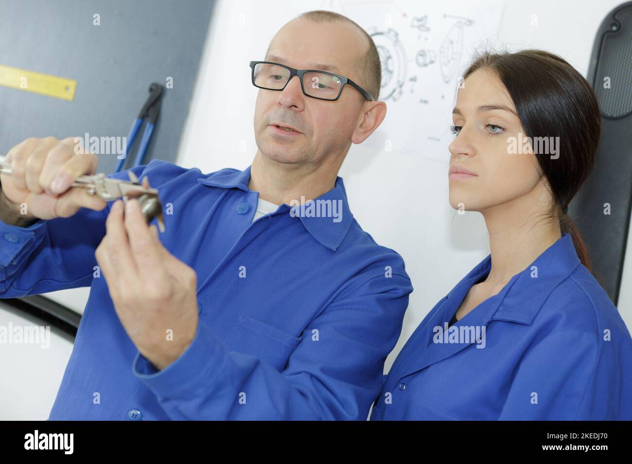 engineers mechanics take measurements from the instrument Stock Photo